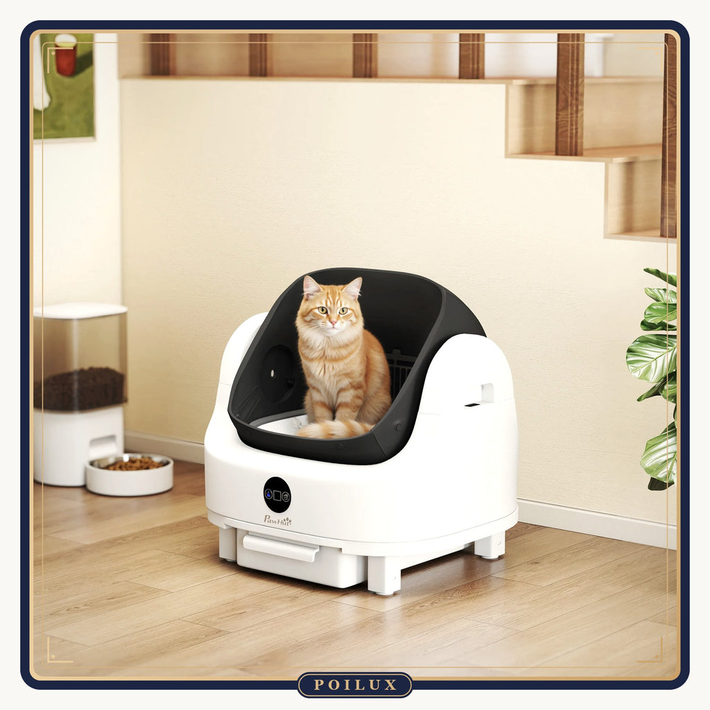 Litière automatique pour chat installée dans un intérieur